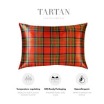 a red tartan pillowcase with text and icons indicating its features and benefits.
